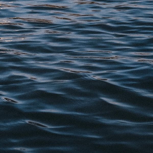 Serene environment with soft ice-blue lighting for meditation and movement